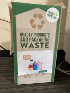 A close-up of the cardboard Terracycle box for beauty products